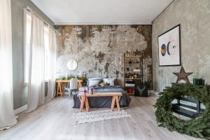 een slaapkamer die in ingedeeld met een industriele look